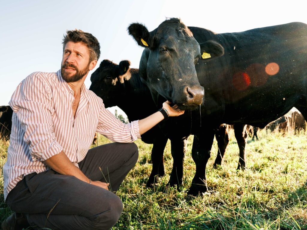 Benedikt with animal at Gut&Bösel